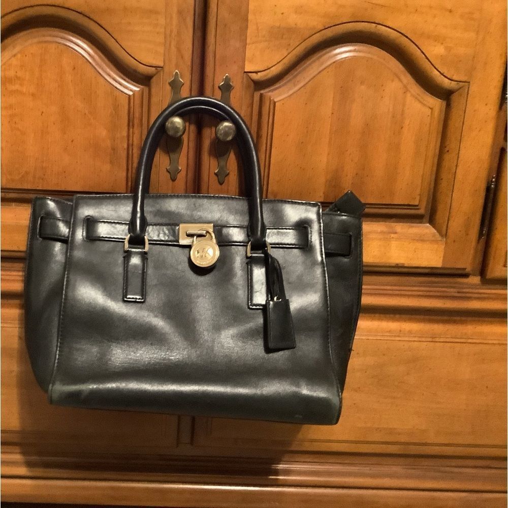 Older medium size Michael Kors Hamilton preowned​